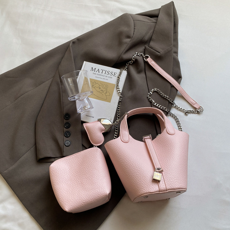 Bolso de madre de cubo de ocio simple para mujer 2025 versión coreana del nuevo bolso de mensajero exquisito de textura de moda ins