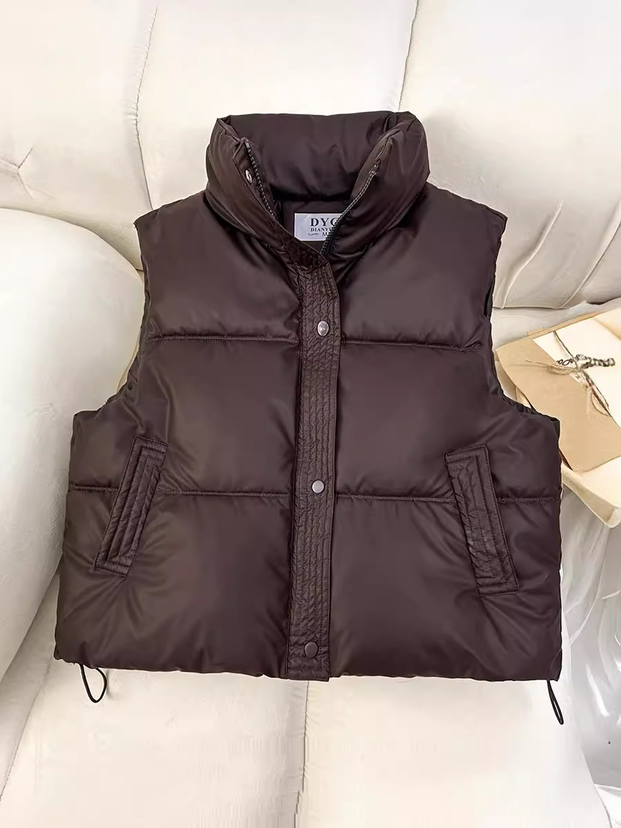 外国貿易のクロスボーダーのダウンの綿服の馬甲の女性は綿の服の短いタイプの秋冬の修身の袖なしの肩の上着の馬を着て潮を挟みます。