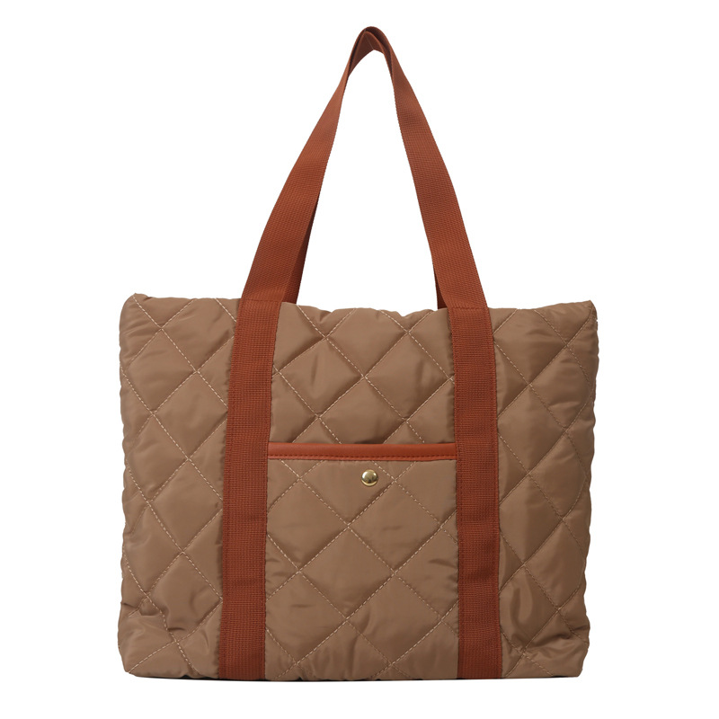 Bolsa de ropa de algodón, bolso de pluma de algodón de mujer, bolso coreano ligero 2025, nuevo estilo de aire extranjero, bolso de hombro de gran capacidad.