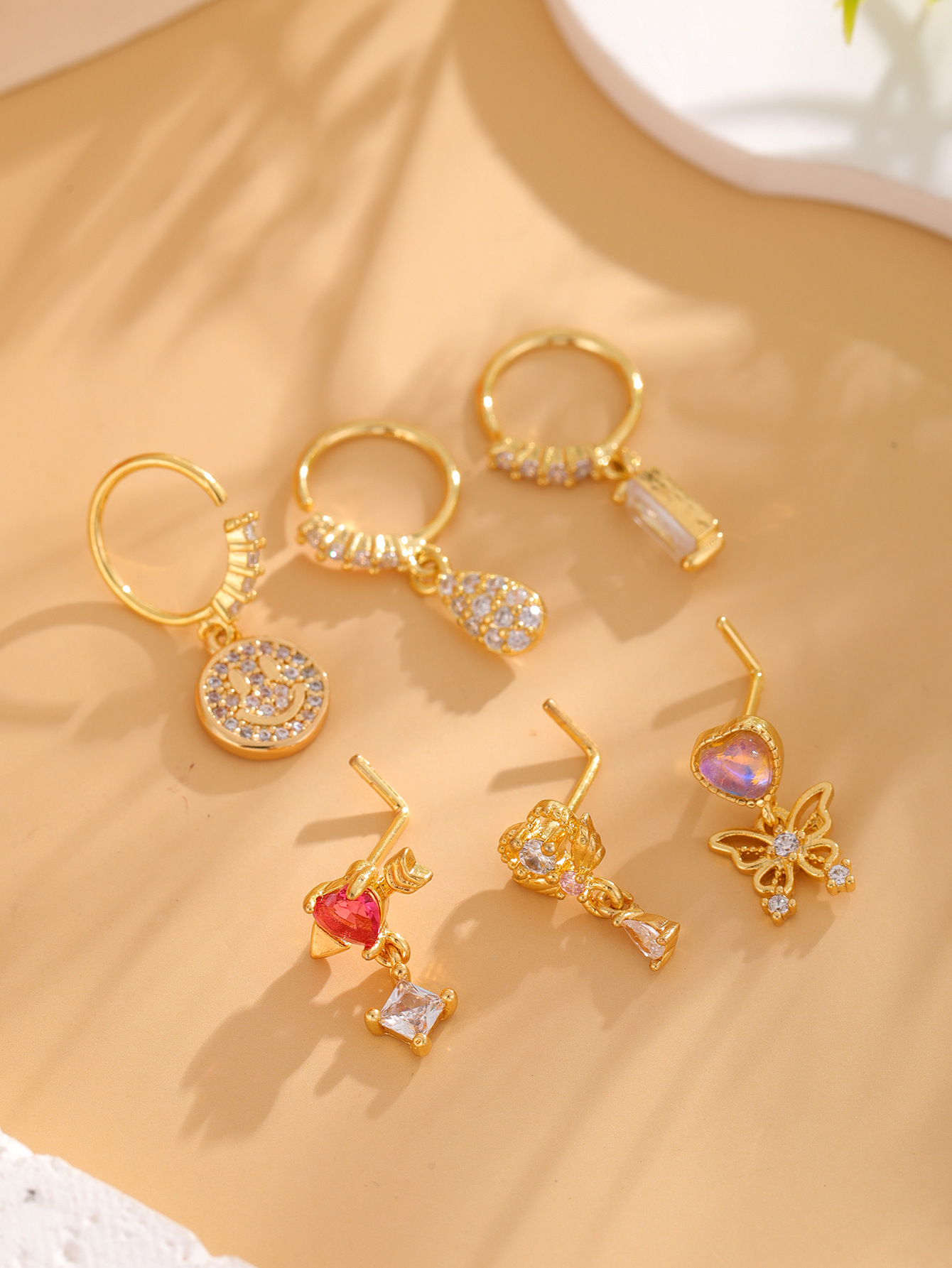 7g Weight Zircon Inlay Material Nose studs Classification Nose Rings & Studs Piercing Type 1 Piece Quantity Holiday, Street Occasion Copper Material Smile Face, Heart Shape, Butterfly Pattern Women's Gender Plating, Inlay Design Retro, Simple Style Style 1 Piece Nose Rings & Studs Retro Simple Style Smile Face Heart Shape Butterfly Copper Plating Inlay Zircon Nose Rings & Studs Nose Pin 2