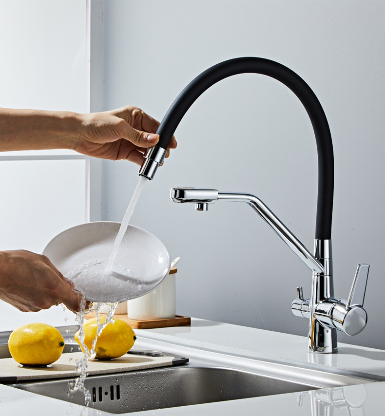 The three-in-one kitchen faucet for cross-border trade is made of all-copper and features a rotatable and pull-out sink with a single hole for direct drinking of cold and hot purified water undefined