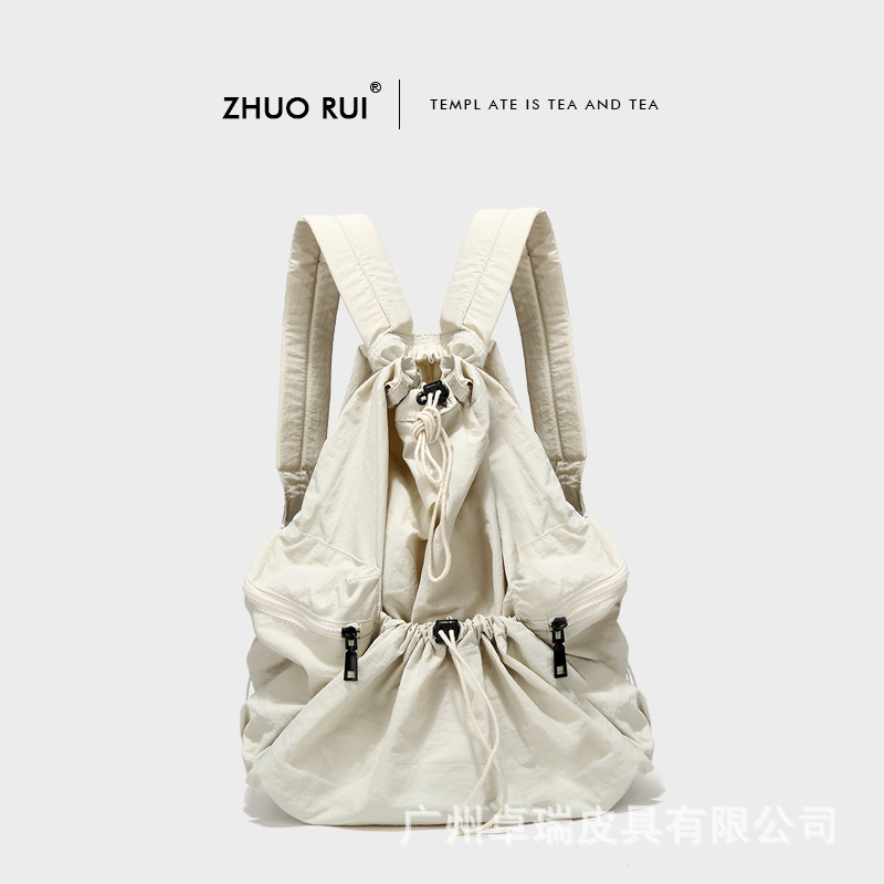 Corea del Sur Dongdaemun nuevo cordón mochila mujer casual gran capacidad estudiante mochila versátil mochila de nylon ligero