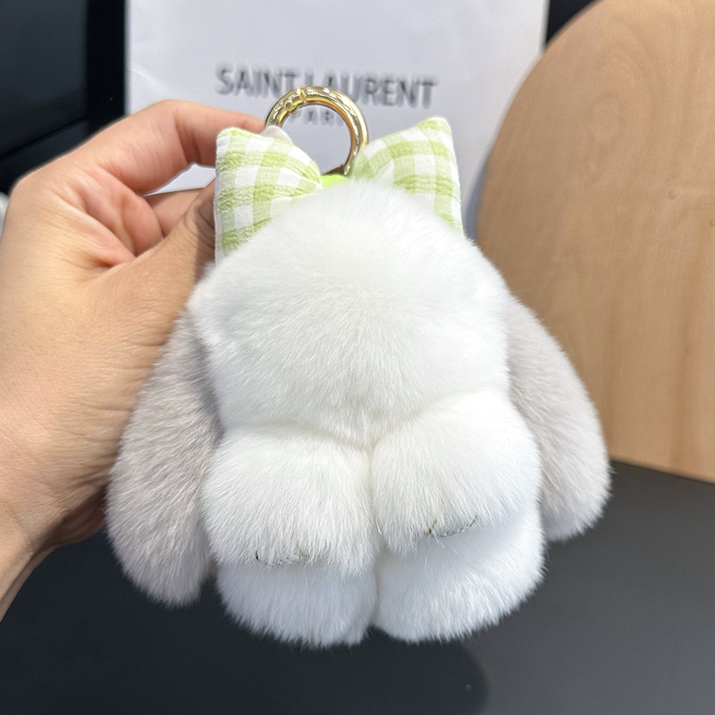 卸売りのかわいいウサギの毛の蝶結びの小さいウサギの自動車のキーホルダーはぬいぐるみのかばんを掛けて飾ります。