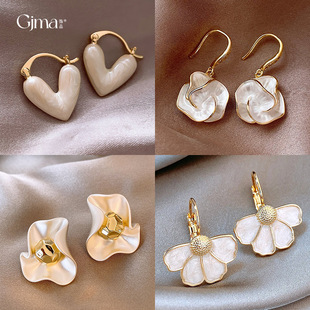 Silver needle flower love tassel earrings simple and fashionable versatile ear buckles small fresh light luxury high-end earrings wholesale