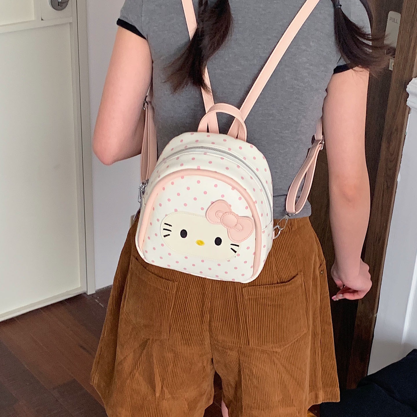 Cat2026 viento de verano mochila de chicas mini mochila encantadora para mujeres punto de onda diario púrpura versátil nuevo