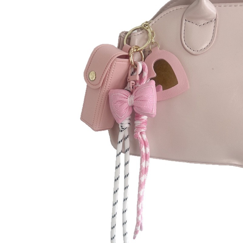 Mini bolso accesorios accesorios 2026 nuevo bolso de lápiz labial con espejo llavero de cuero colgante de cadena de teléfono móvil