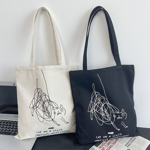 Niche personality graffiti design cute cat one-shoulder canvas bag women's summer portable commuting bag