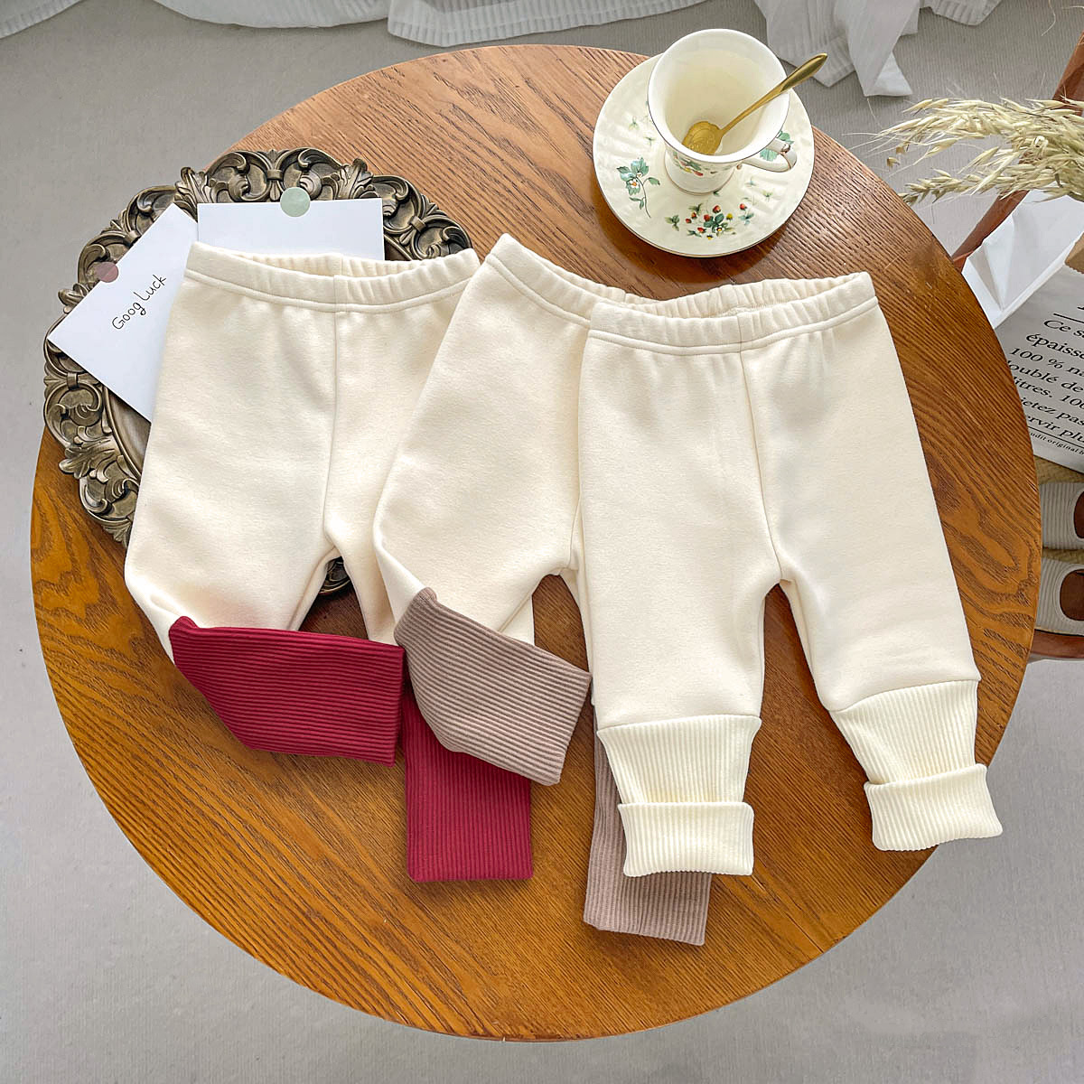 INS leggings forrados de lana para niños cálido estilo coreano costura de una pieza de terciopelo Otoño e Invierno para hombres y mujeres pantalones a juego fuera