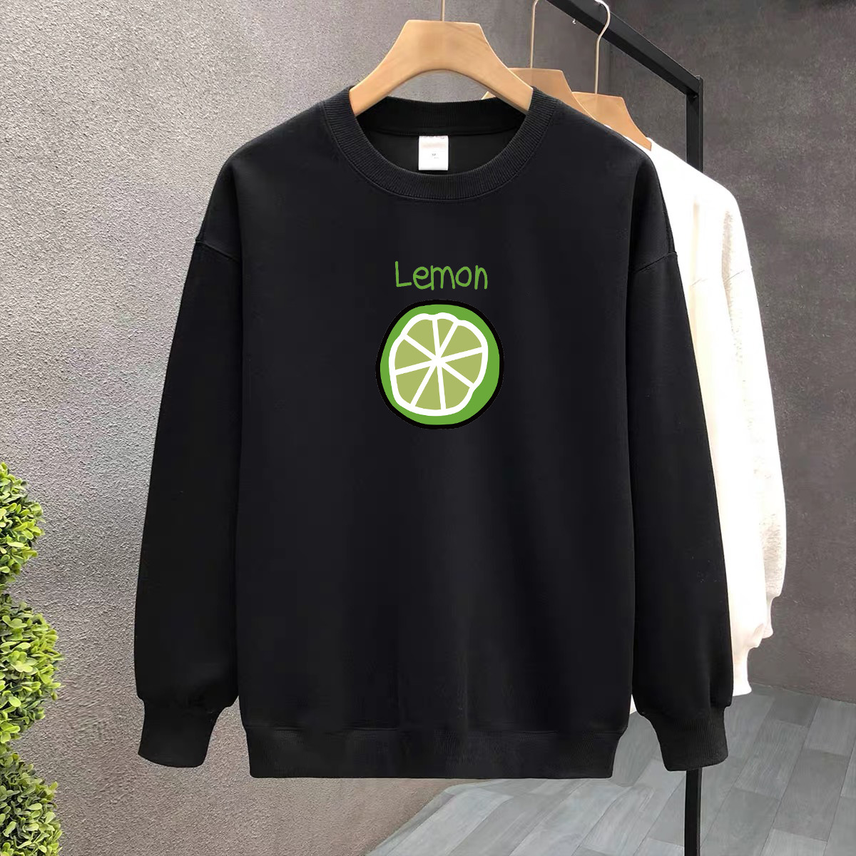 Suéter de algodón negro pesado de alta gama para mujeres 2025 otoño y invierno nuevo estilo europeo y americano camiseta de manga larga fondo suéter de estudiante