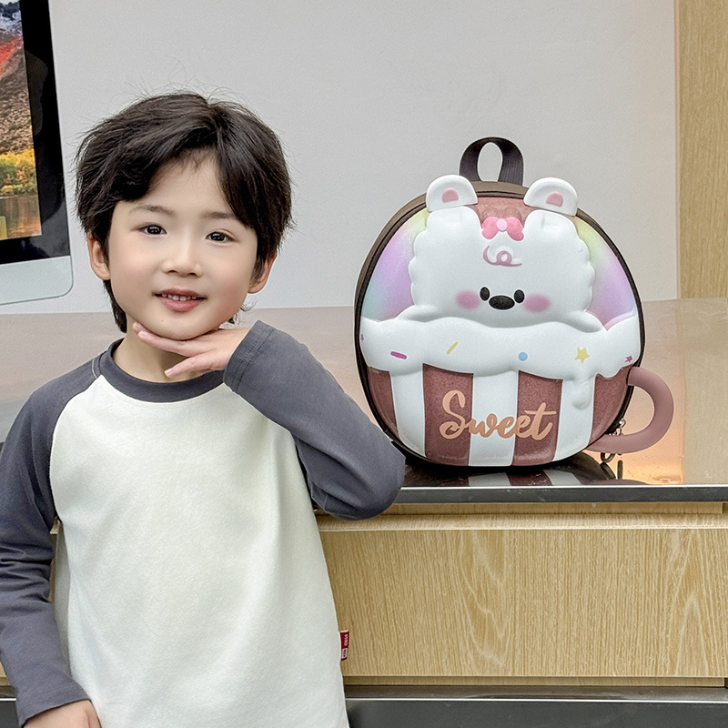 Jardín de infantes bebé mochila de cáscara de huevo dibujos animados lindos tazas de té de leche mochila para niños y niñas nueva mochila infantil transfronteriza