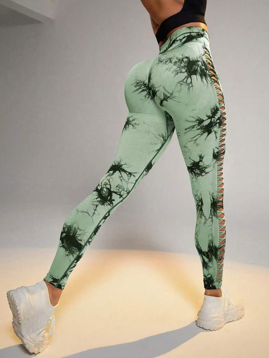 Transfronterizo de cintura alta hueco atado teñido de camisa de mel桃 hips fitness deportivo pantalones ajustados malla sexy ropa de yoga para mujeres