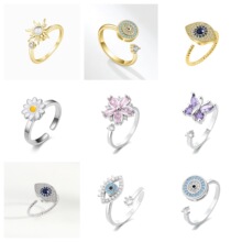 亚马逊外贸款欧美高级感旋转戒指缓解压力铜微镶蝴花朵戒指转动戒