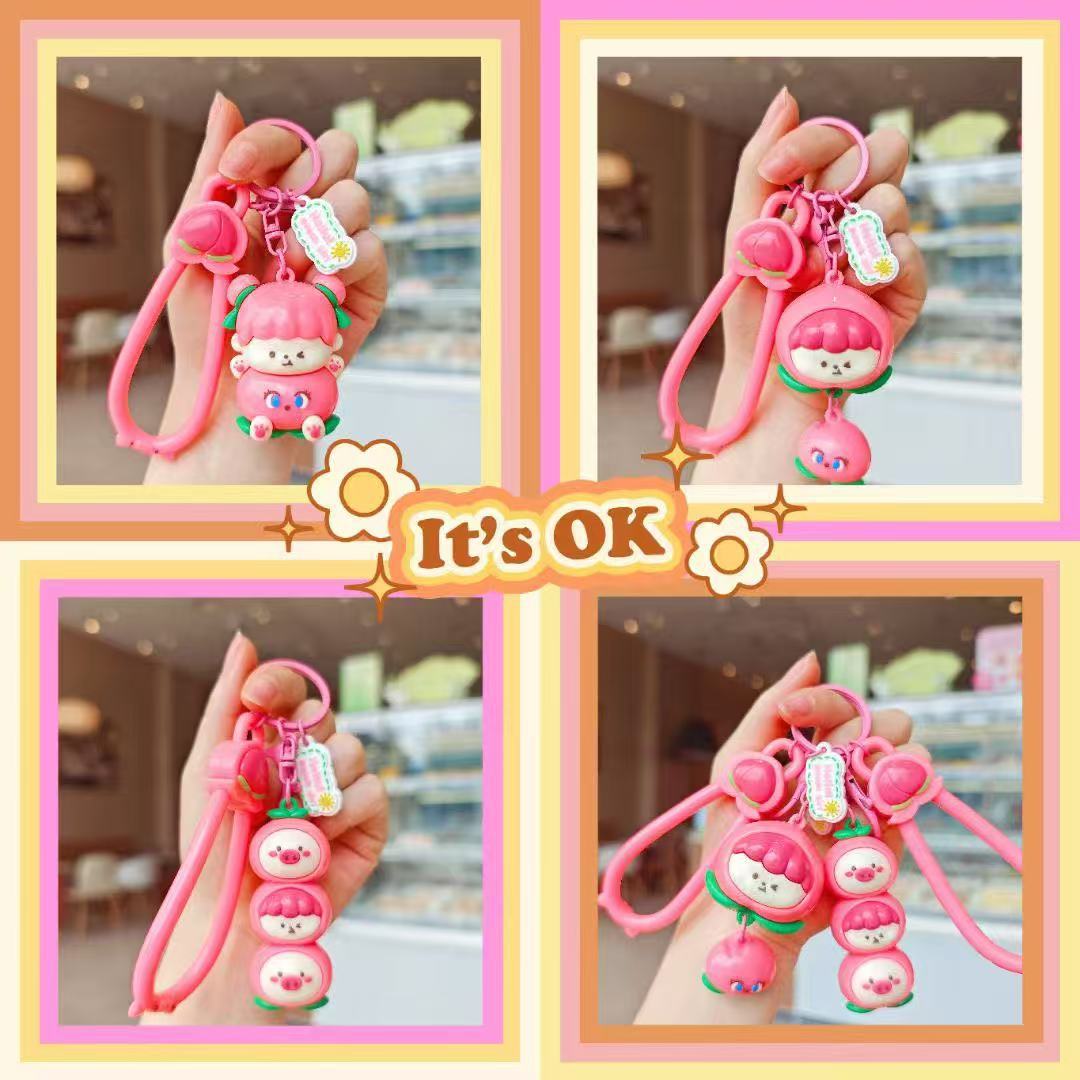 Llavero de melocotón lindo original Peach Yunlian muñeca de dibujos animados colgante pequeño llavero de coche mochila colgante de bolsa