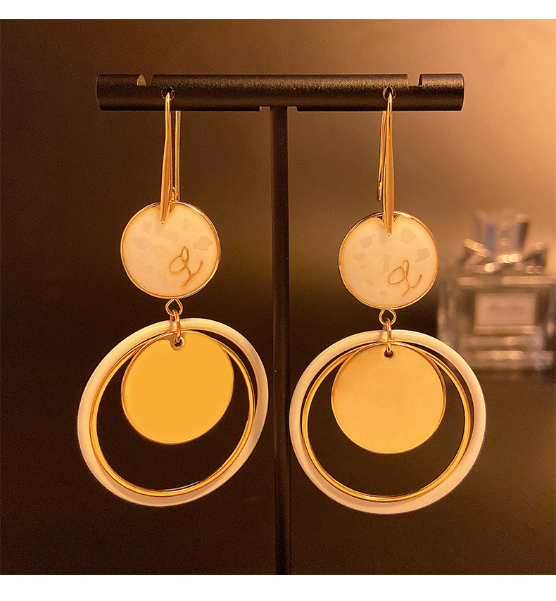 Metal geometric circle hollow out long niche design, fashionable earrings, simple and high-end style earrings_voghion.com
