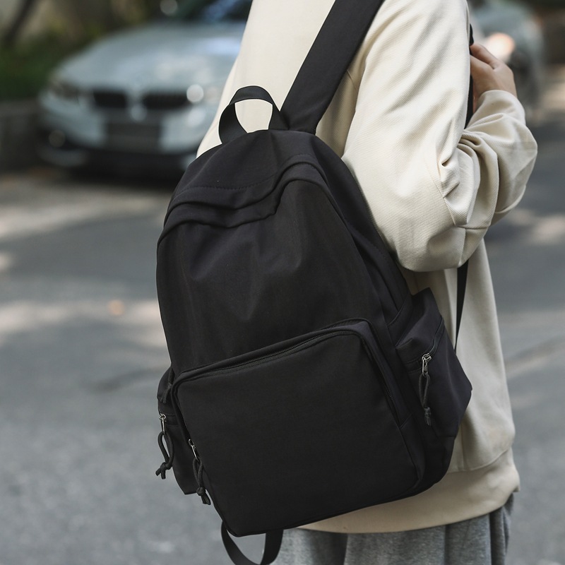 2024 invierno nueva mochila ligera de nailon de gran capacidad casual simple y versátil mochila para computadora para estudiantes de secundaria