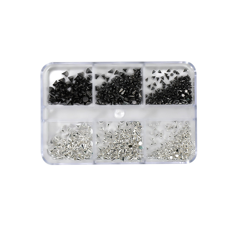 Red de celebridades Nail Art Remache Wear Armor Caja de 6 cuadrículas Mezcla Mini bala francesa Punk Metal Nail Decoración al por mayor