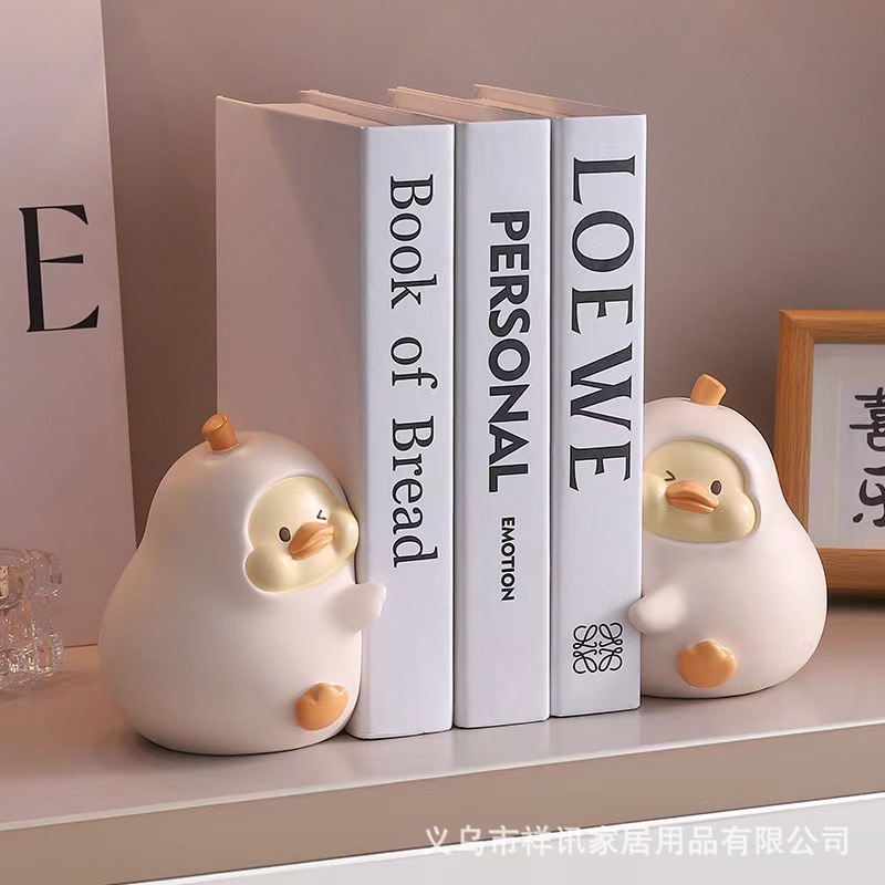 분리되지 않은 오리 북엔드 장식품 + 가짜 책 3권