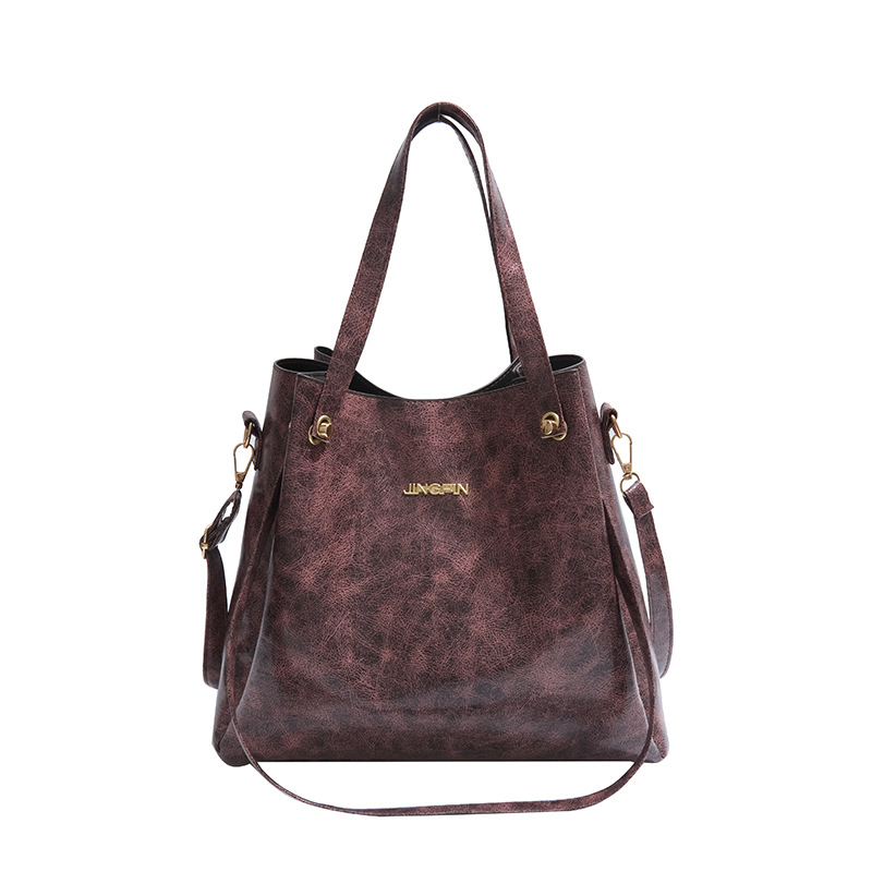 Mochila de moda de cuero suave de gran capacidad 2025, primavera nueva bolsa de hombro de viaje, bolso de mano de cuero retrógrado para mujeres