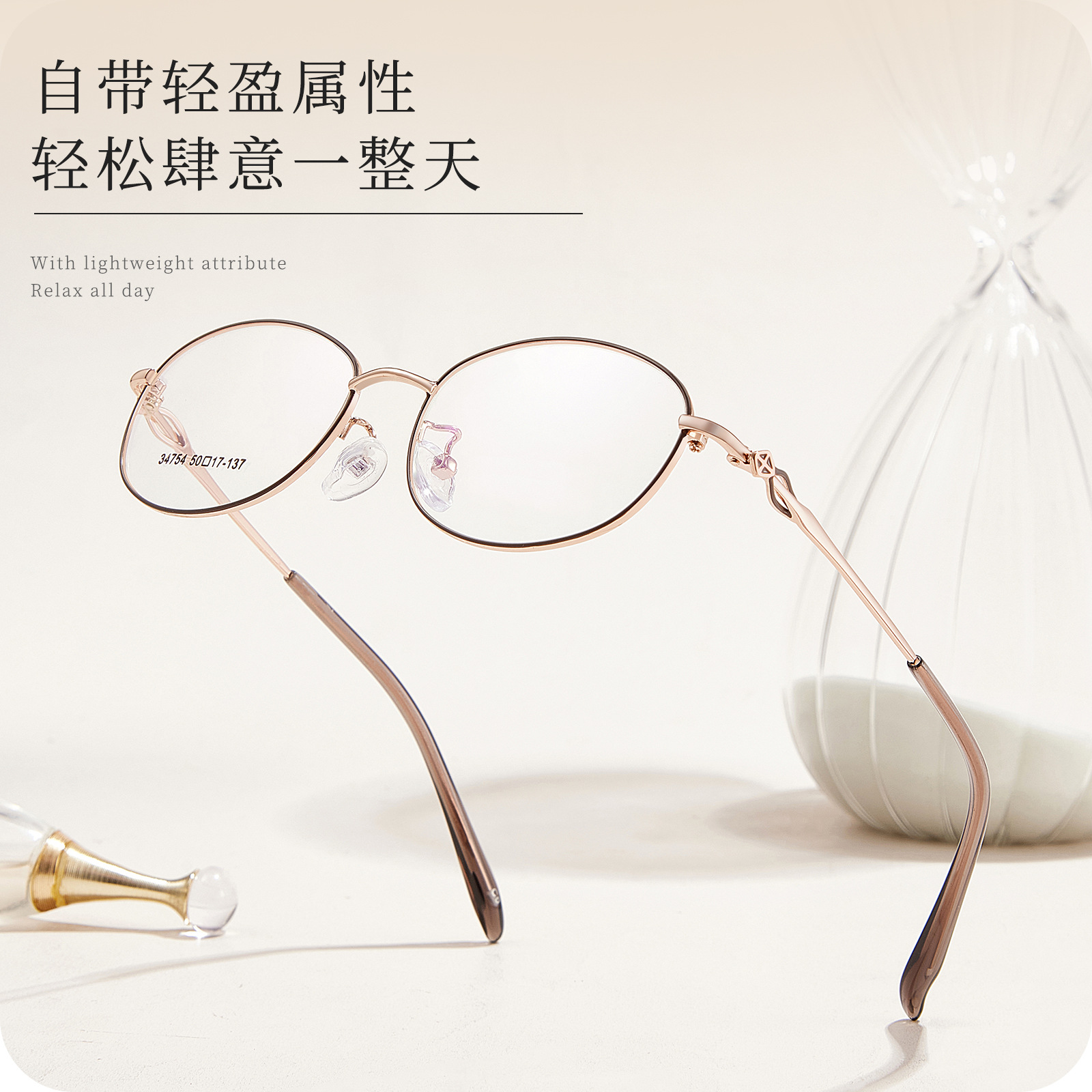 Té con leche único, gris, calidad, aleación, marco de gafas para mujer, espejo hueco exquisito, resistente a la corrosión, espejo Danyang al por mayor