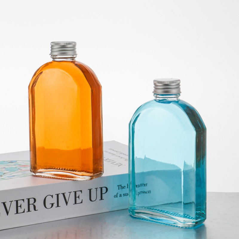 现货批发拱形扁方透明玻璃瓶冷泡茶斜肩创意冰酒瓶铝盖果酒瓶