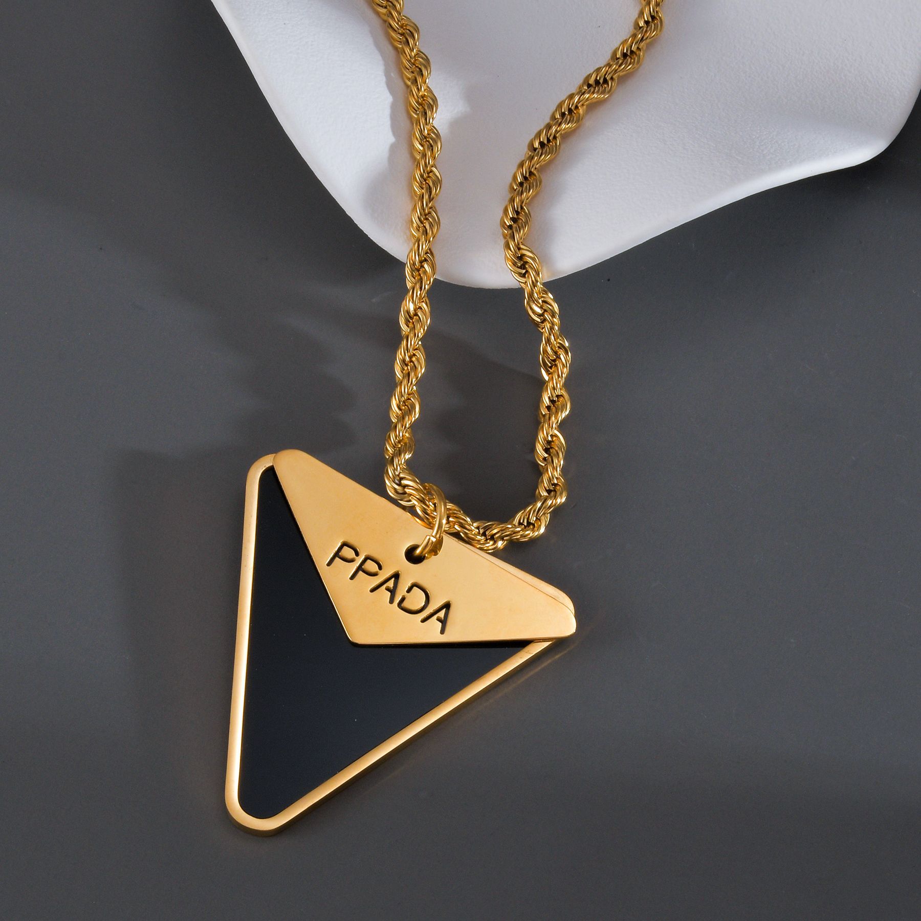 Black necklace with letters