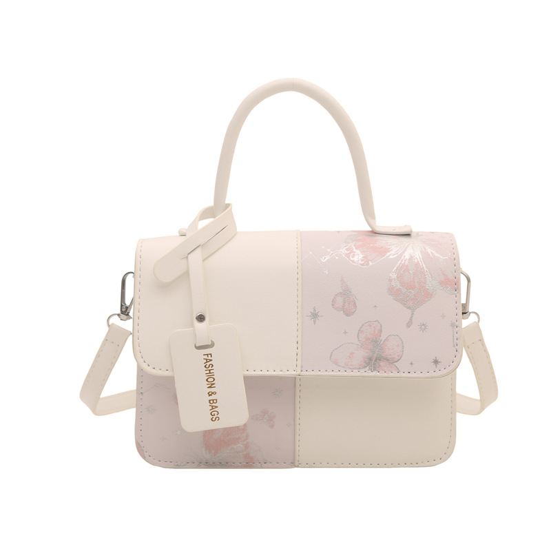 2026 nuevo paquete de hombro extranjero empalmado paquete de hombro de moda simple bolso de mano casual bolso pequeño transfronterizo