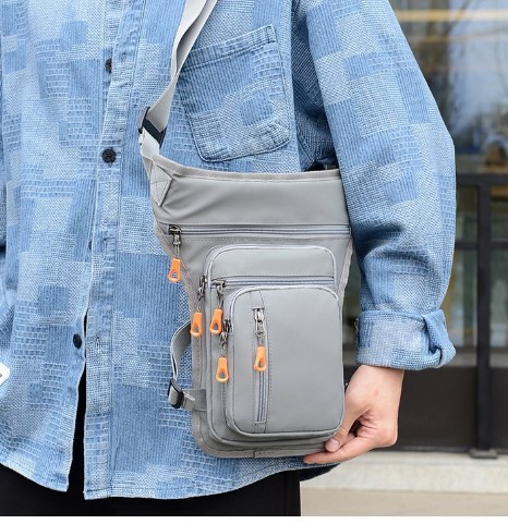 Bolso de cintura bolso de mensajero multifuncional para hombres nuevo bolso de pecho de nicho simple personalidad de la moda bolso de pierna fresco de moda fábrica al por mayor