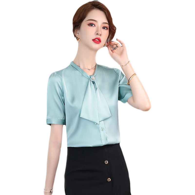 Green summer fashionable elegant professional shirt with bow