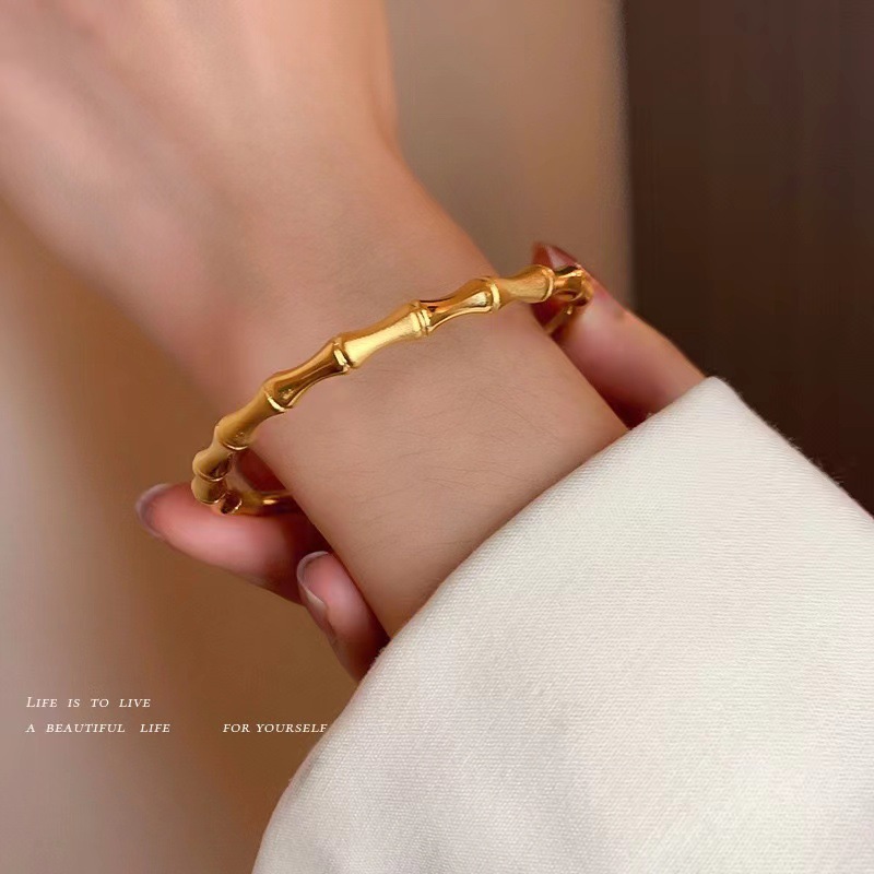 Bracciale rigido a nodo di bambù in acciaio titanio da donna_voghion.com