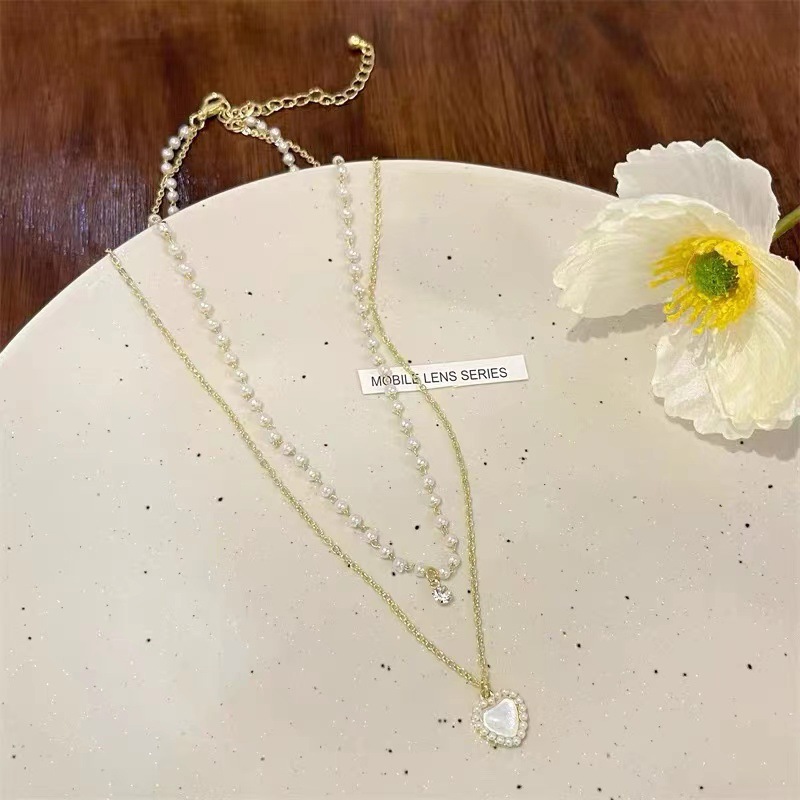 Élégant Sucré Forme De Cœur Alliage Placage Incruster Perles Artificielles Zircon Femmes Collier En Couches display picture 3