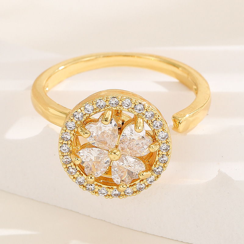 18K oro real color-preservar la suerte de la hierba estilo coreano transfronterizo diamante incrustado rotación de moda abierto anillo ajustable