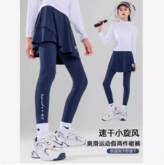 女の子のスカートと秋の子供の速乾の偽の2つのズボンのスポーツのズボンのスカートのテニスのトレーニングは底のバドミントンのユニフォームを打ちます。