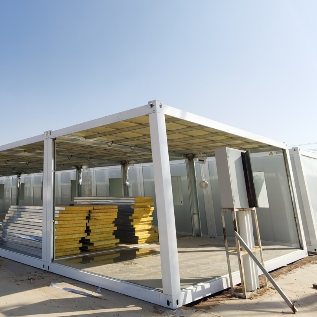 Casa de juntas móvil, construcción temporal, fábrica de dormitorios, infraestructura, hospital, acero de color, alojamiento de doble capa, casa de juntas de contenedores con decoración