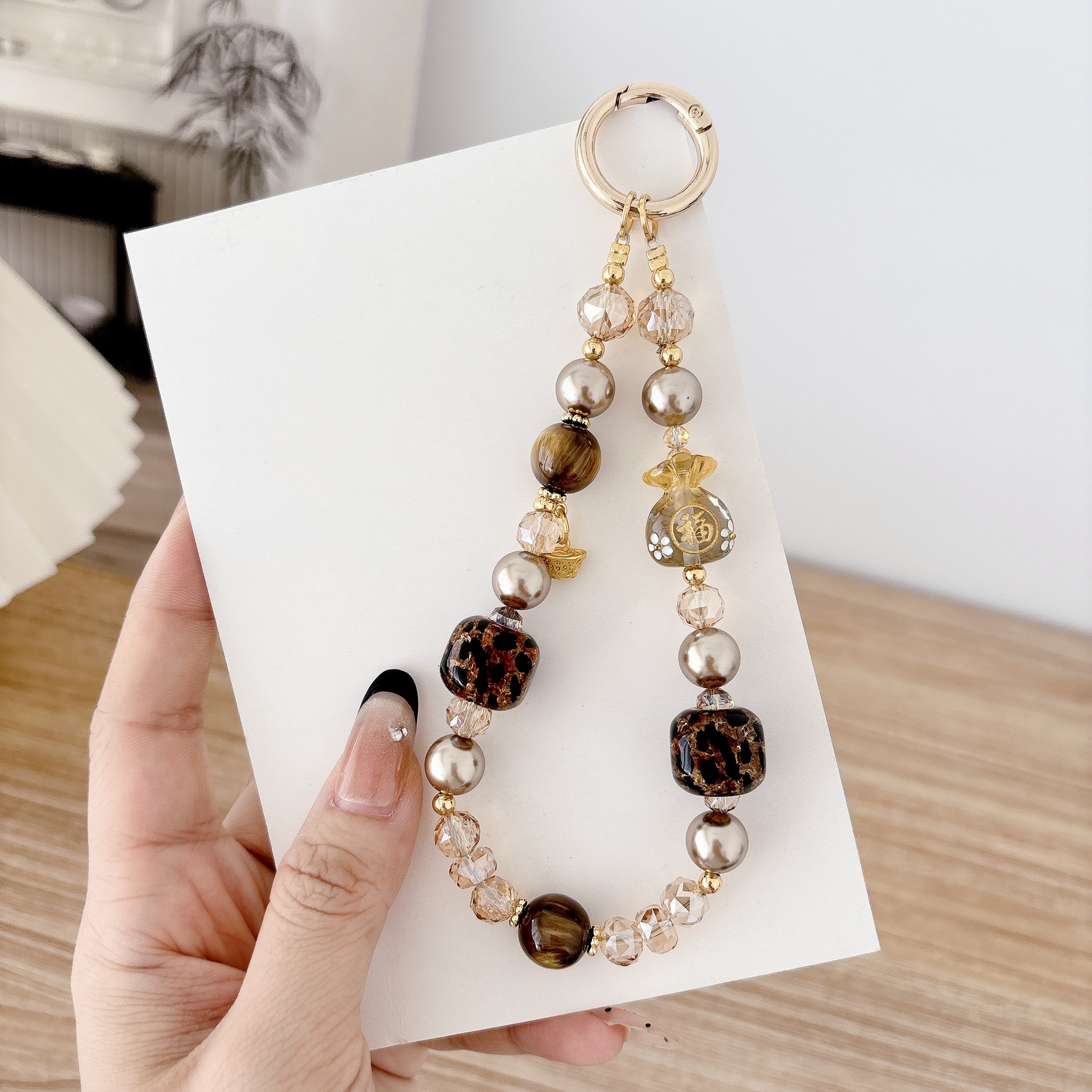 La sensación de alto nivel de lujo ligero bolso Fuyuan Bao cadena de teléfono móvil cadena de teléfono móvil bolso llavero colgante nicho diseño