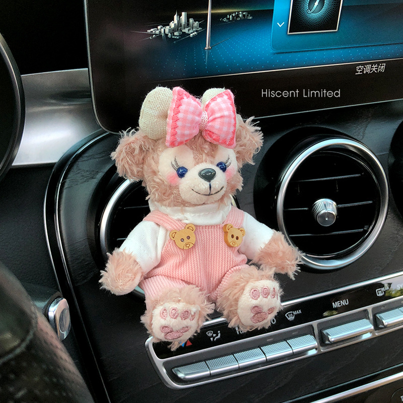 2025 nuevo coche muñeca oso de felpa Tamiflu coche aromaterapia de salida de aire decoración interior accesorios de coche decoración mujer