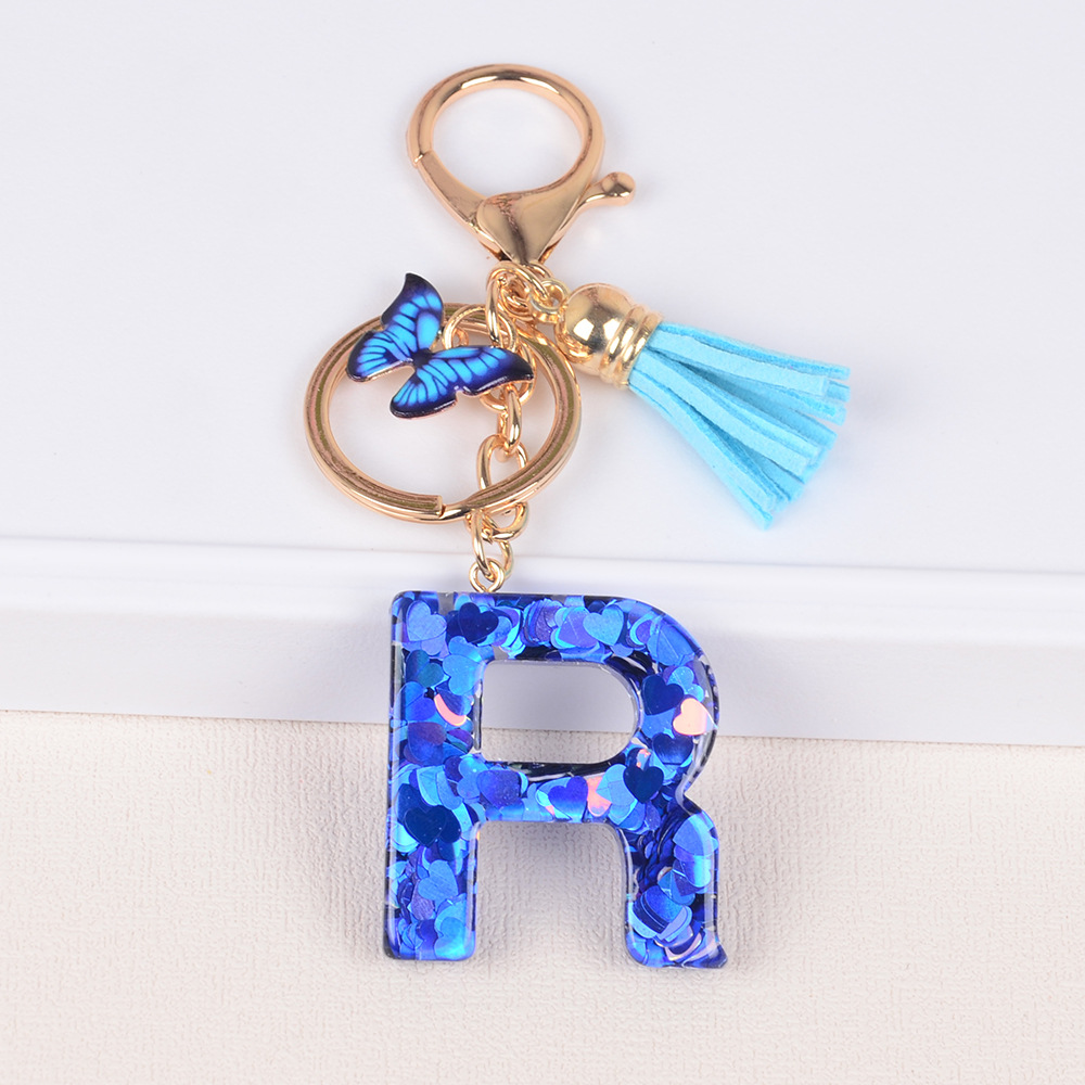 Cross-border Hot Sale 26 letras inglesas llavero de resina de goteo de goma esquinilla llavero de letras de amor personalizado