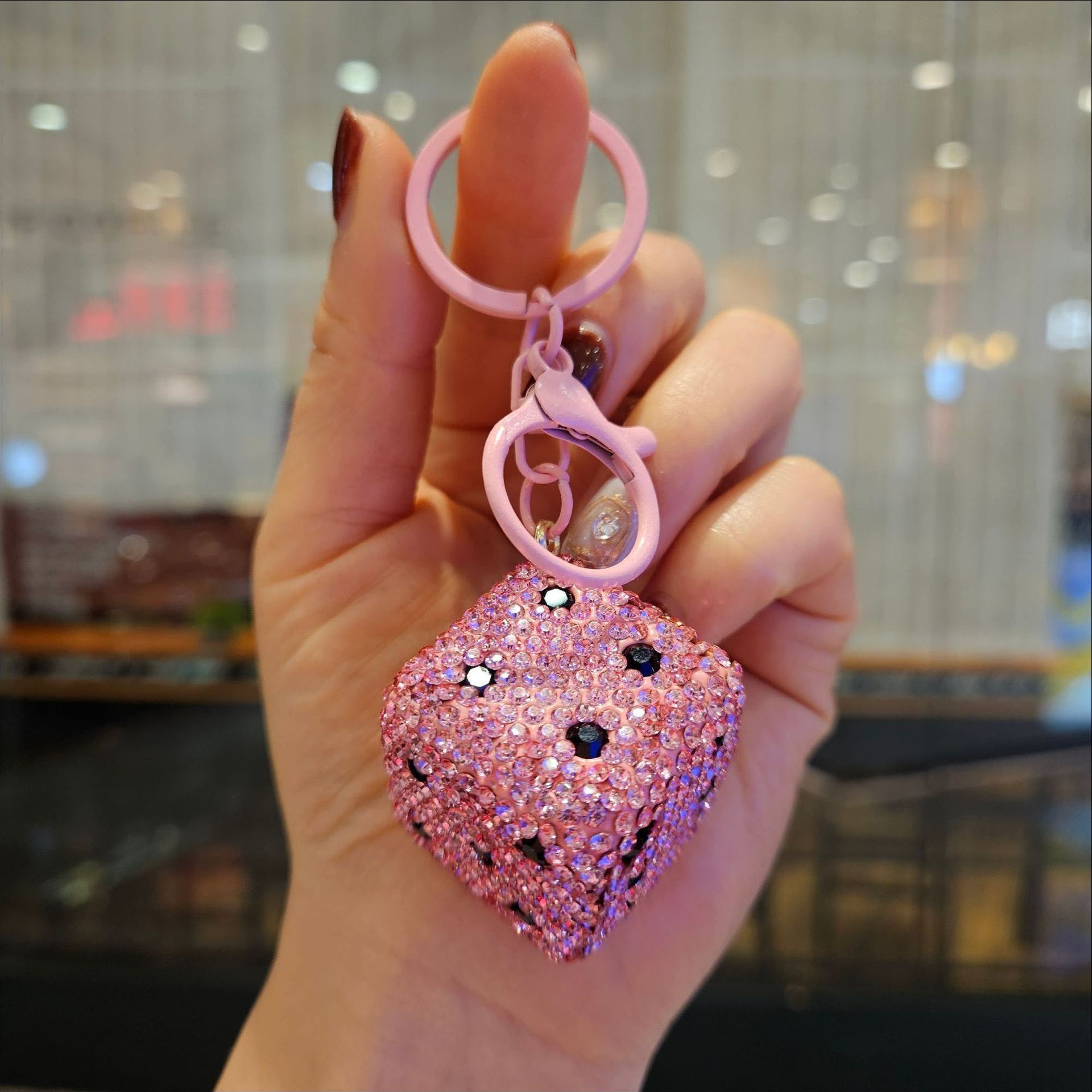 Diamond-encrusted dice—pink