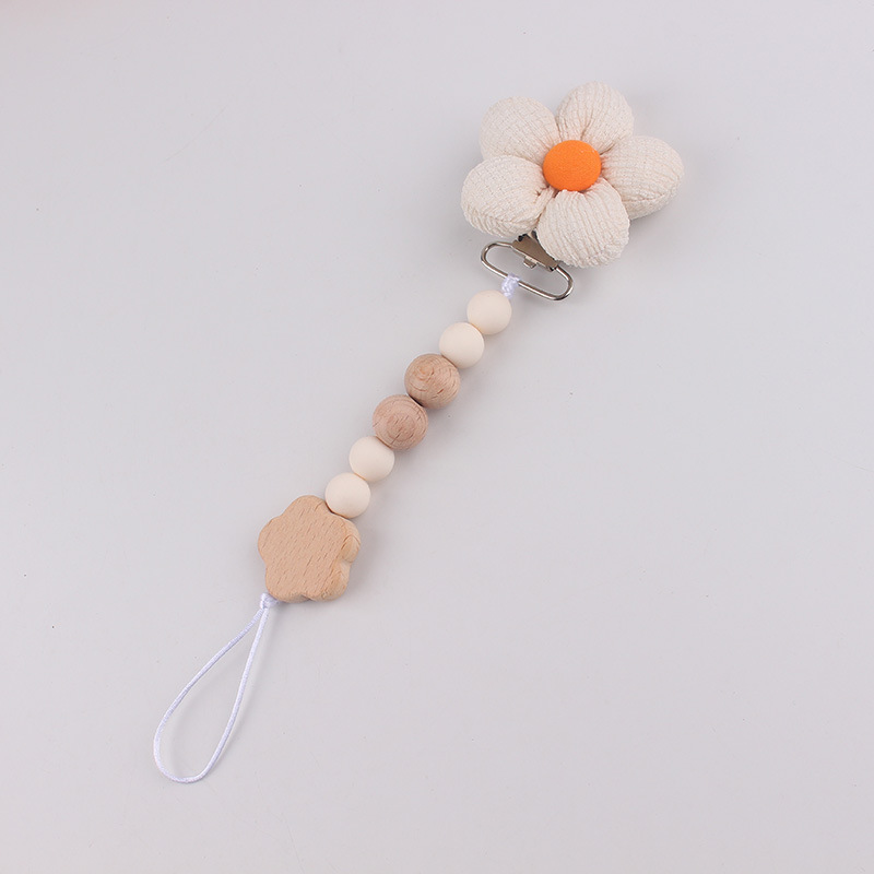 Productos para bebés pacificadores de tetas anti-caída cadena INS cadena de diente de viento flor de madera