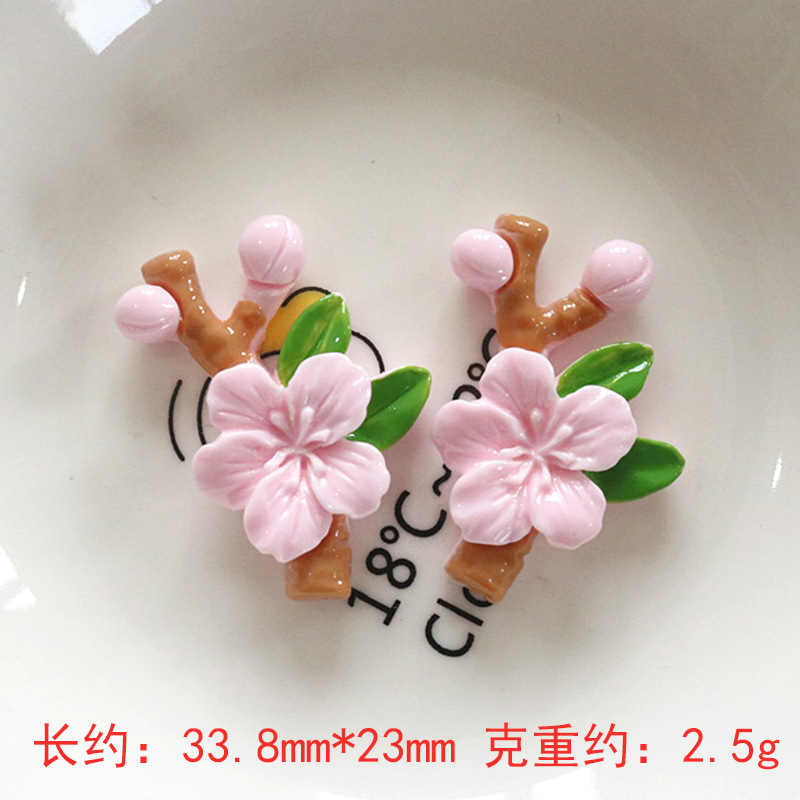 Nuevos accesorios de bricolaje de flor de durazno de resina rosa, zapatos con agujeros de pegamento de crema, fundas para teléfonos móviles, accesorios para el cabello, material de imán para refrigerador al por mayor