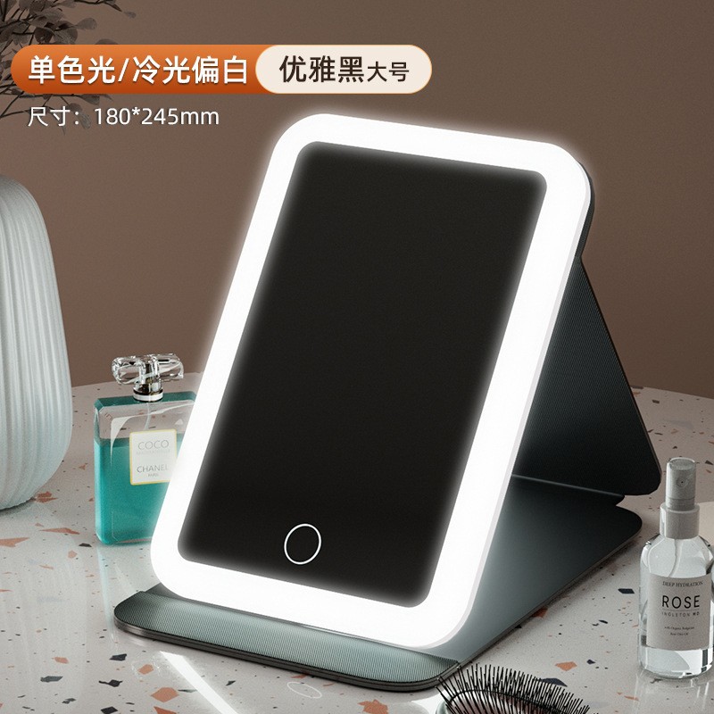 Espejo de maquillaje LED espejo de belleza plegable espejo de maquillaje de escritorio carga con luz de tres colores espejo de relleno de luz entrega al por mayor