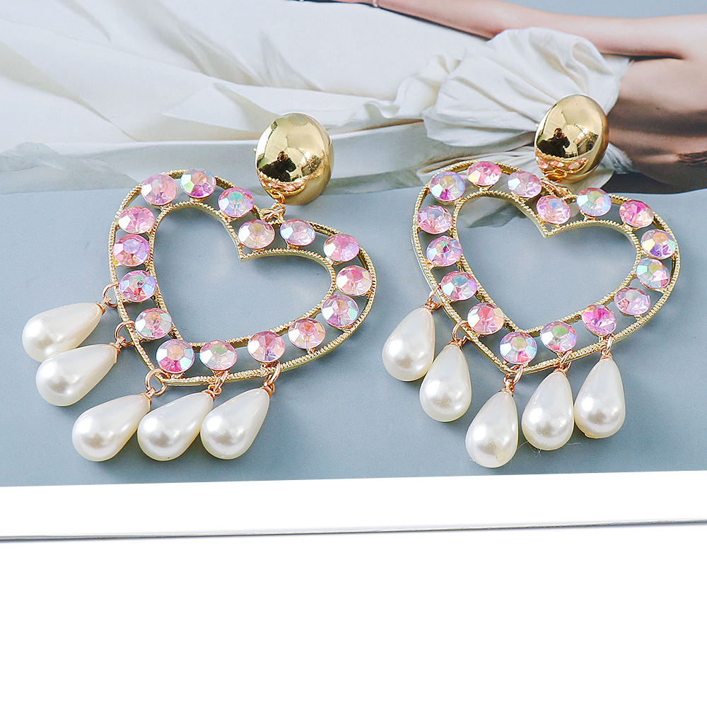 Creative Heart-shaped Water Drop Pearl Shape Female Stud Earrings display picture 3