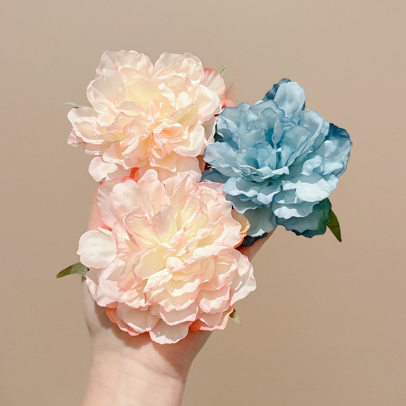 2025 brota de cabello en línea sensación de alto nivel rosa boca de pato mar de cabello cortado bordes de cabello clip de cabello flores adornamiento de cabello mujer