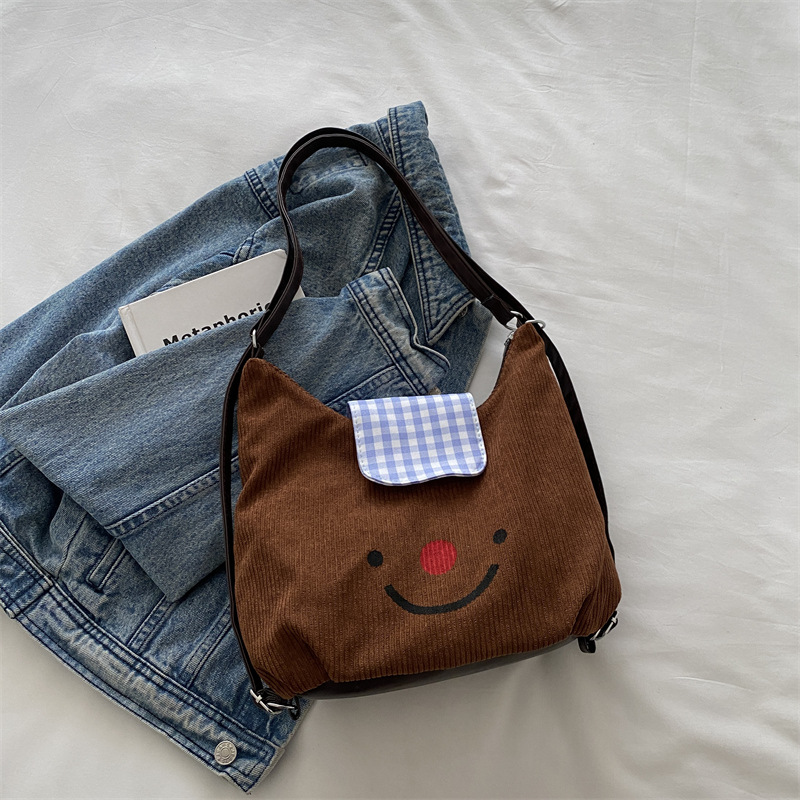 Vintage velcro nariz roja sonriente bolso de mano para mujeres otoño y invierno 2024 gran capacidad mochila de viaje mochila