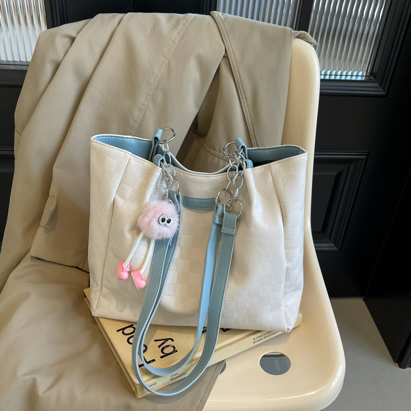 Bolsa de hombro a cuadrillas de alto nivel 2024, nueva bolsa de viaje simple de gran capacidad para estudiantes universitarios.