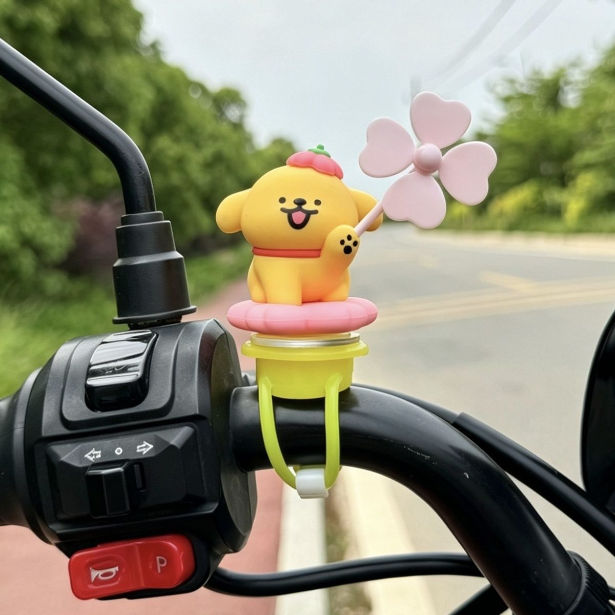 Bicycle dog figurine, windmill line dog ornament, electric vehicle decoration, cute motorcycle accessory