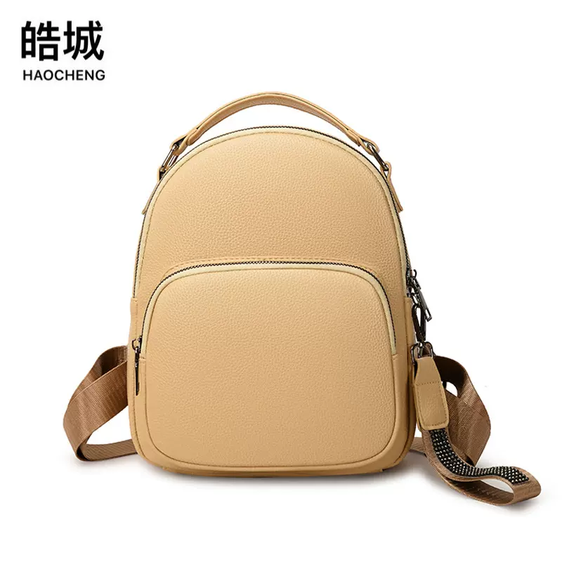 跨境批发2025新款休闲女式软皮双肩包时尚铆钉都市小清新背包书包