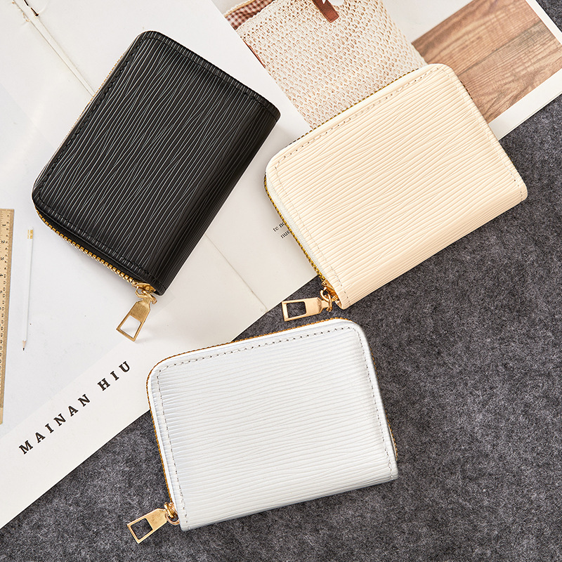 Monedero corrugado de agua corto para mujer transfronteriza japonesa 2024 billetera pequeña con cremallera bolso de mano corto bolso de moneda