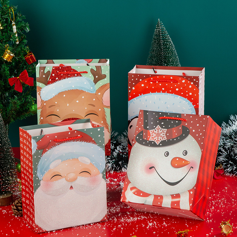 Navidad suelta Rosa dibujos animados muñeco de nieve Navidad ciervos Navidad Eve caja de regalo bolsa de regalo extra grande bolsa de papel portátil