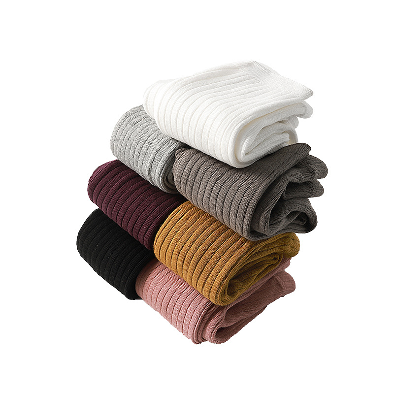 Primavera, Otoño e Invierno nueva princesa bebé polainas al por mayor de los niños de color sólido rayas verticales bebé pantimedias