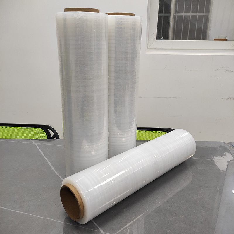 Fábrica al por mayor transparente recubierto PE bobina de película estirable bandeja de película recubierta mano película de embalaje de plástico